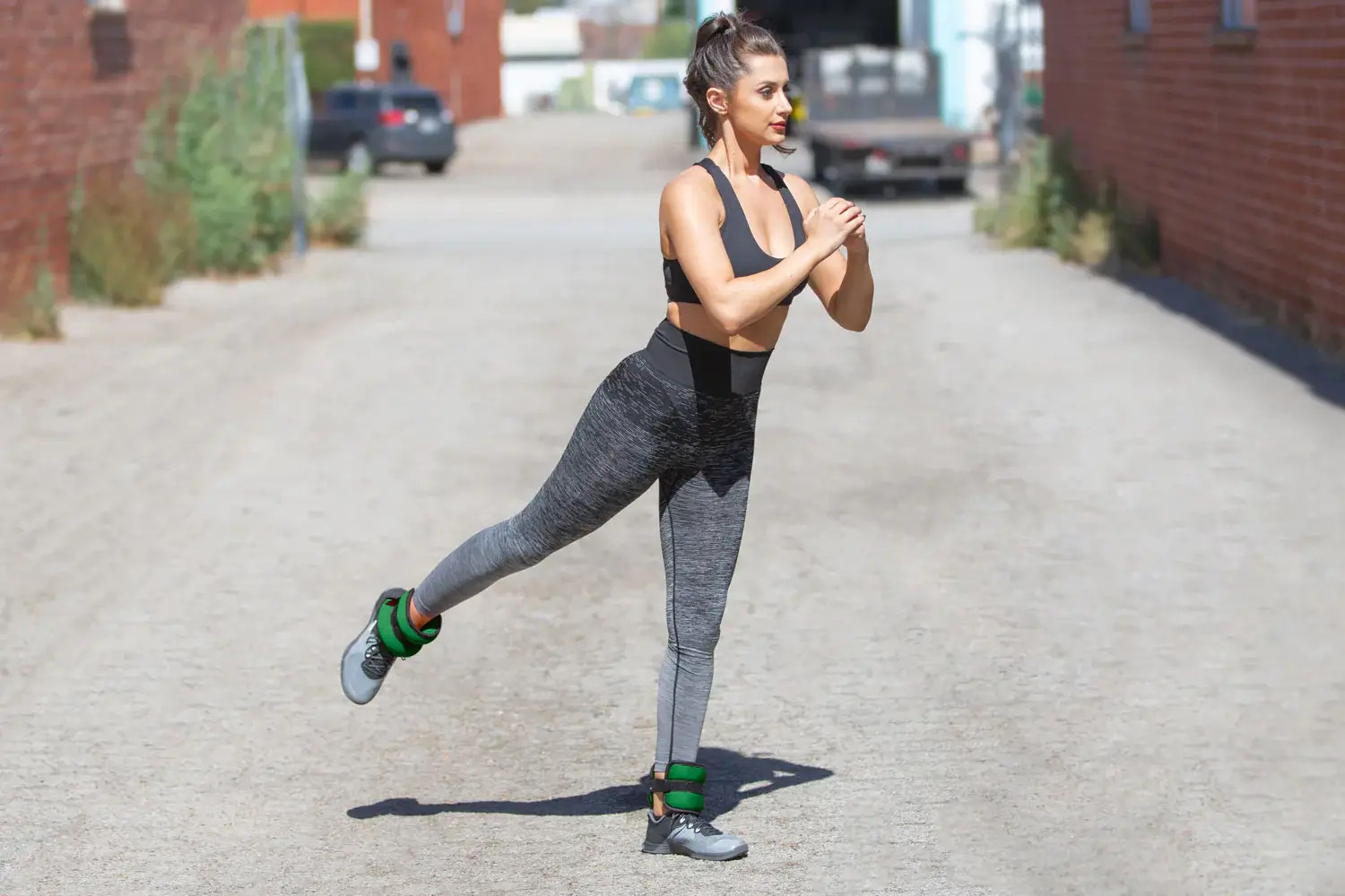 Woman the use of ankle weights when running or walking