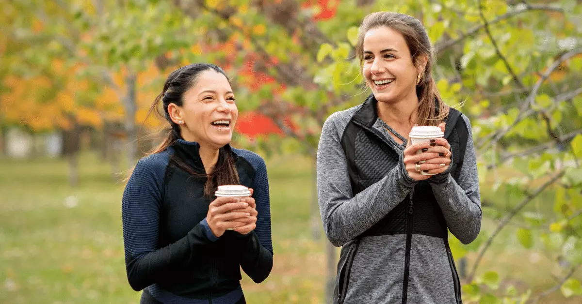 Runners having coffee after running