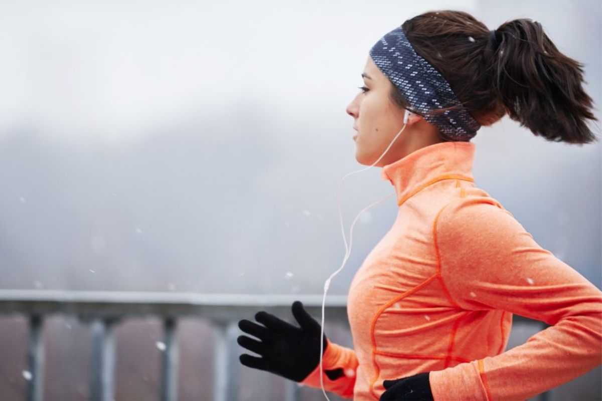 Woman running in gloves