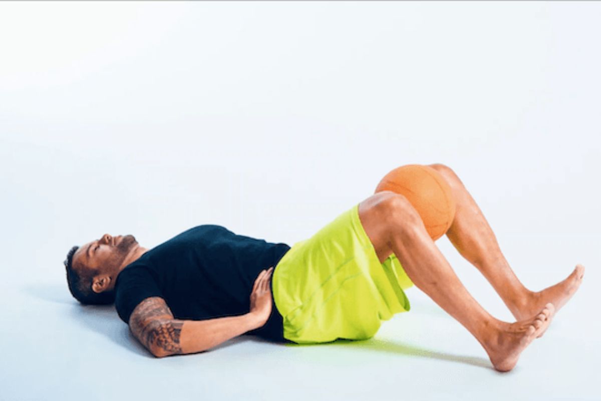 Runners do isometric ball squeeze exercise to strengthen the muscles