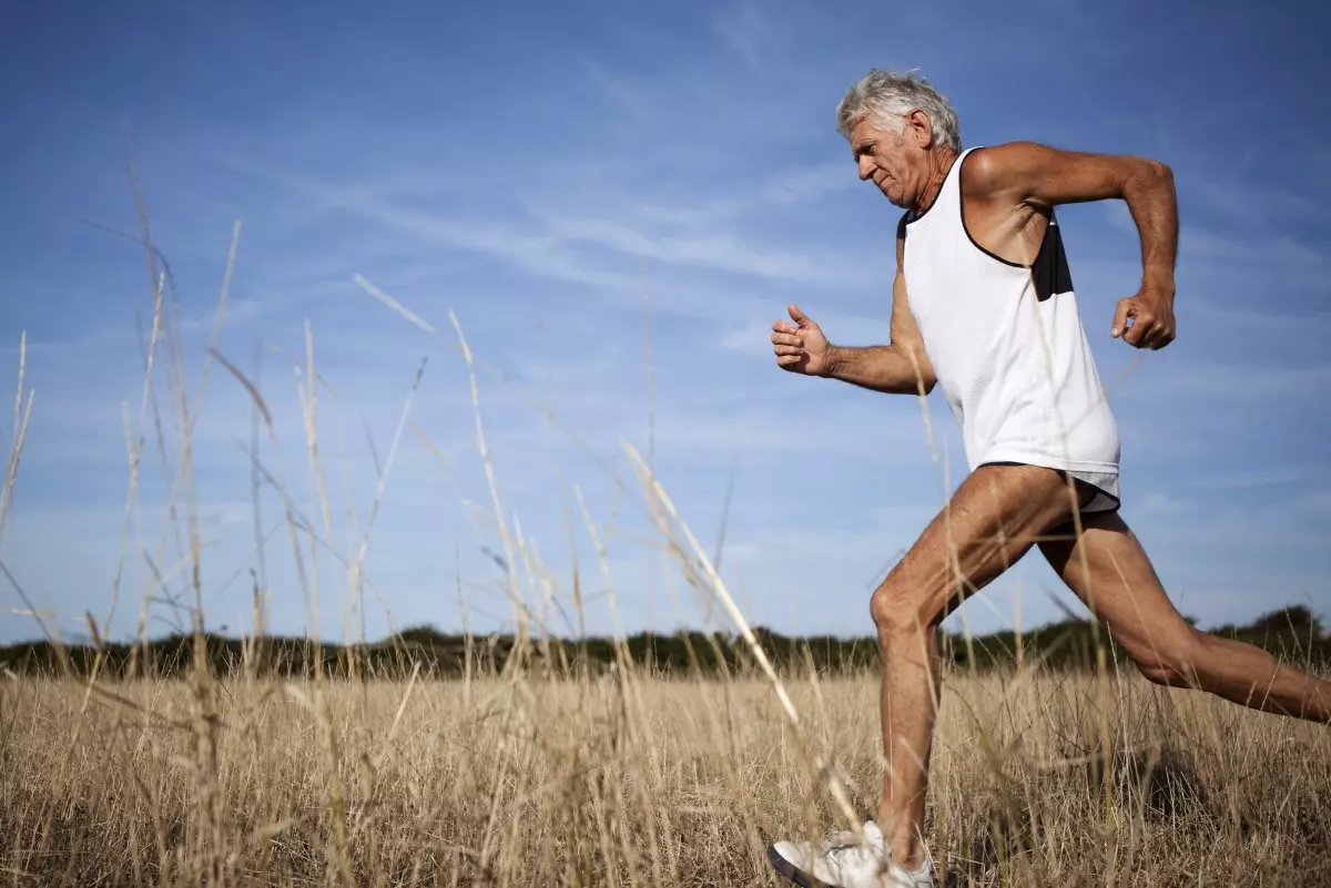 Older men run in special shoes to protect their safety