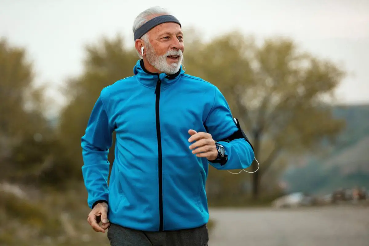 Older adult man running outdoors