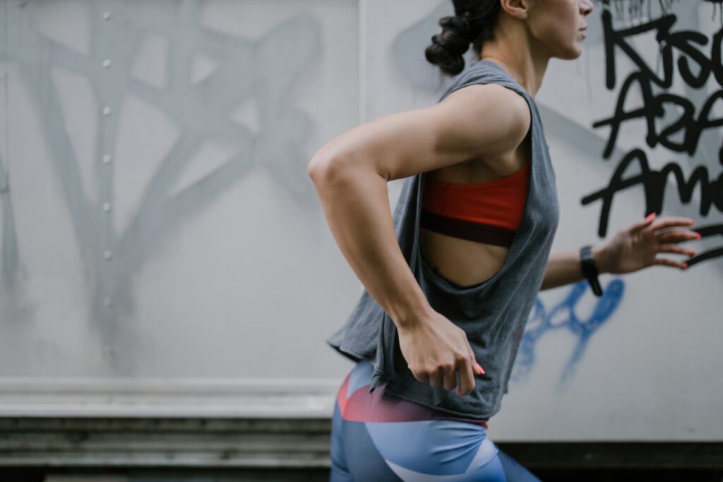Woman running in Double-layer tank top