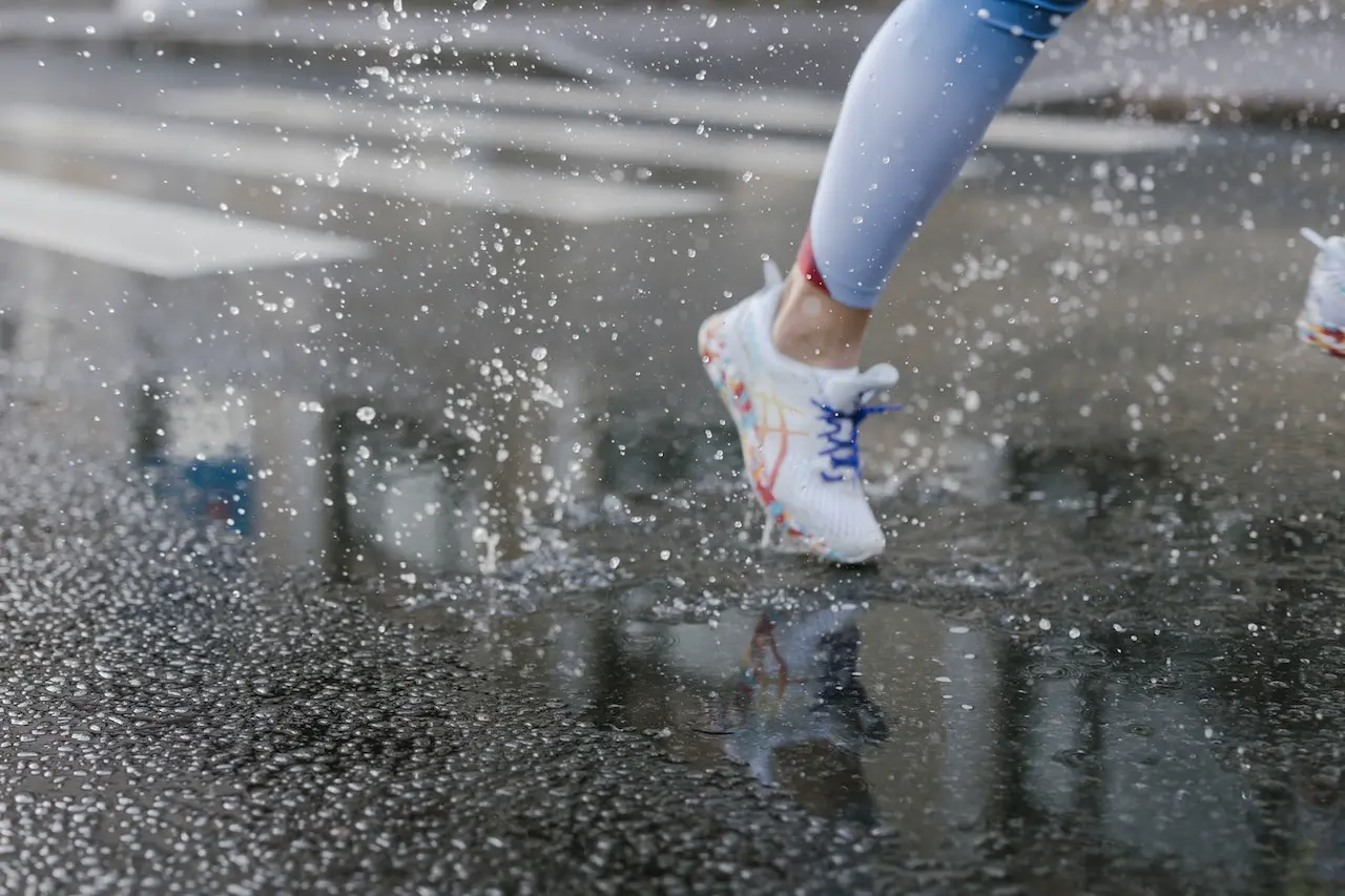 Running shoes wet from the water splashes and other factors