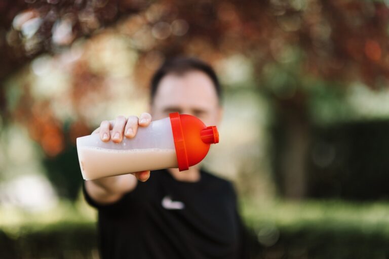 Man prepared protein shake for training