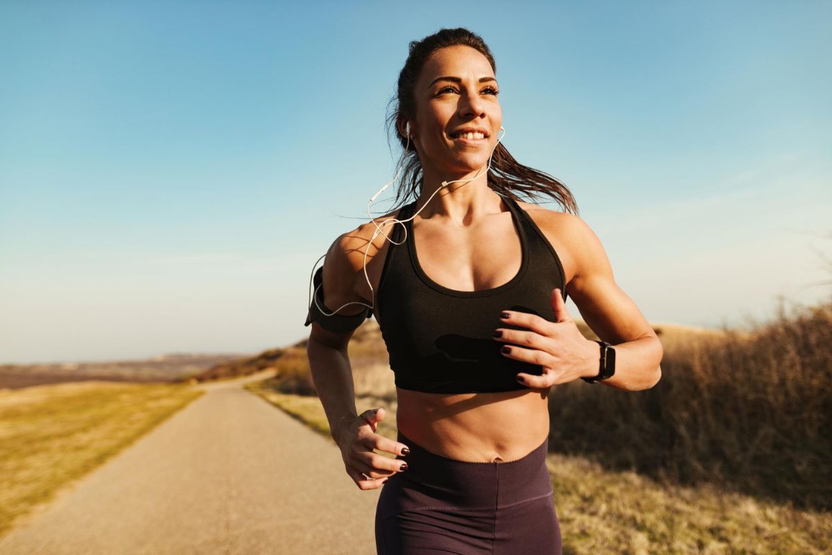Woman have music fartlek workout