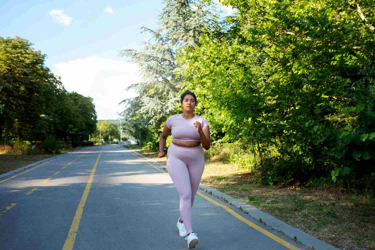 Overweight woman running outdoor