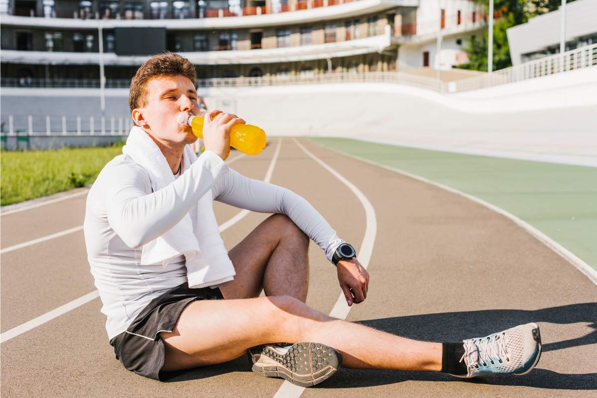 Man drink recovery shake for runners