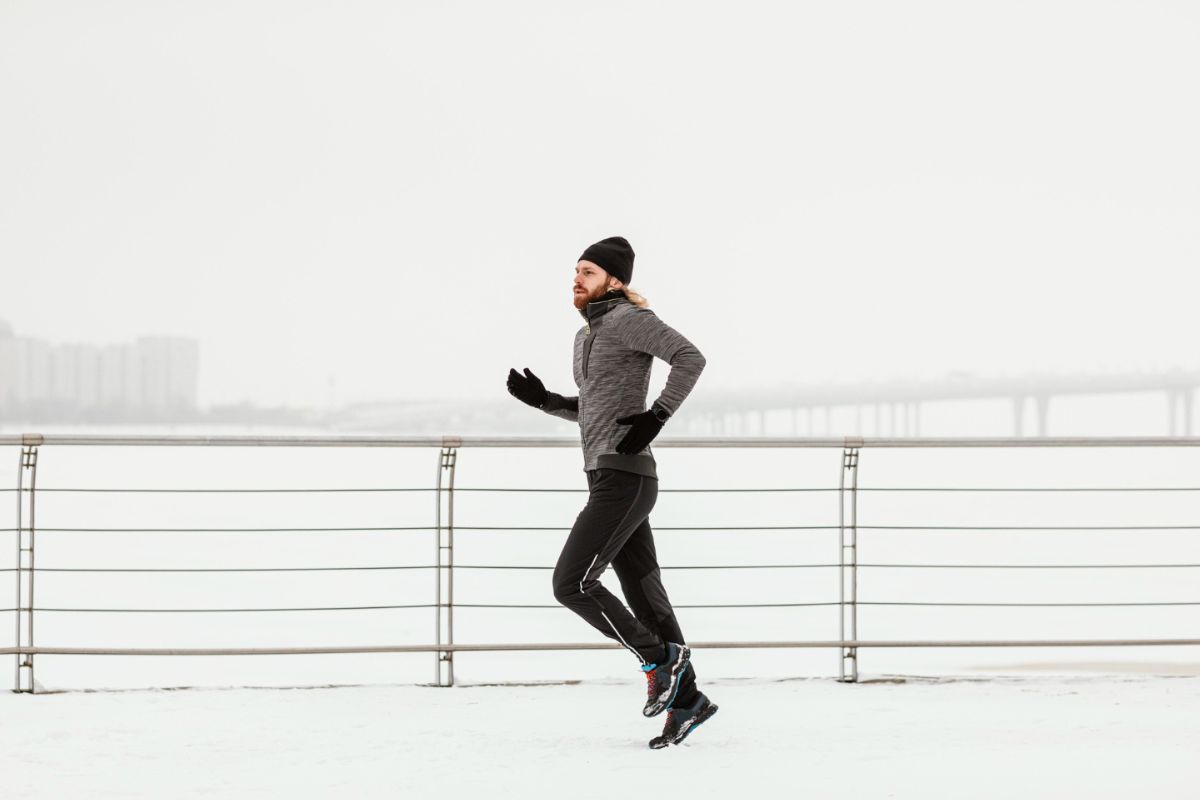 Man running outdoors in freezing temperatures
