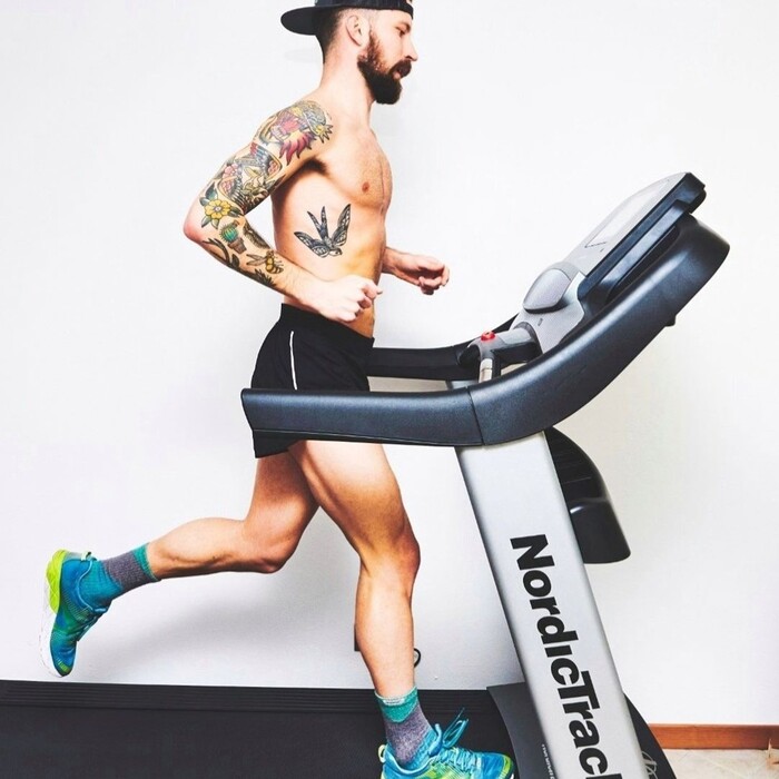 Man running on a Nordictrack Treadmill T Series