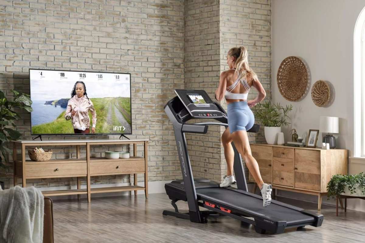 Woman running on ProForm Carbon TLX Treadmill