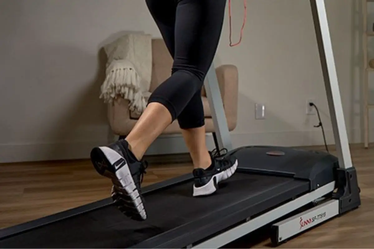 Woman running Sunny SF T7515 treadmill